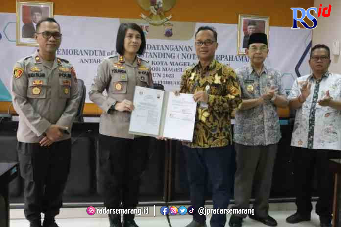 kerja sama_rsz KERJASAMA : Kapolres Magelang Kota AKBP Yolanda Evalyn Sebayang menandatangani kerjasama dengan Wali Kota Magelang dr. H. Muchamad Nur Aziz.